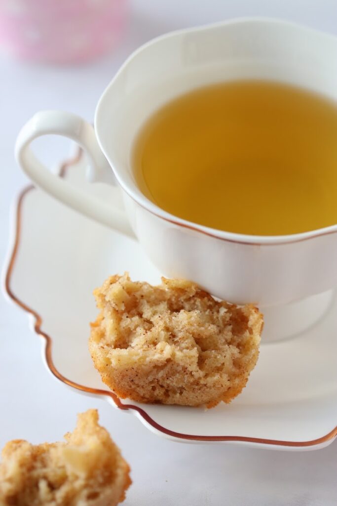 apple muffin cut with tea cup