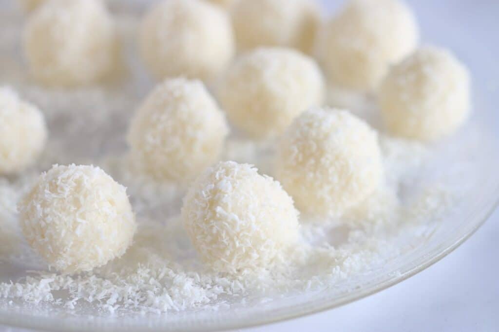 Coconut treat balls on a plate