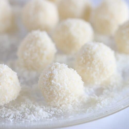 Coconut treat balls on a plate