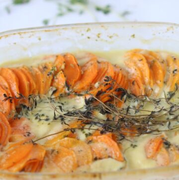 creamy sweet potato baked in a pan with thyme