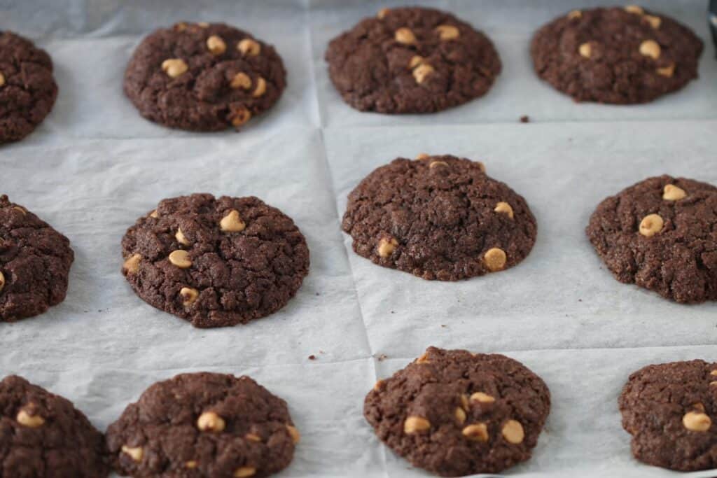 chocolate peanut butter chip cookies on a baking pan