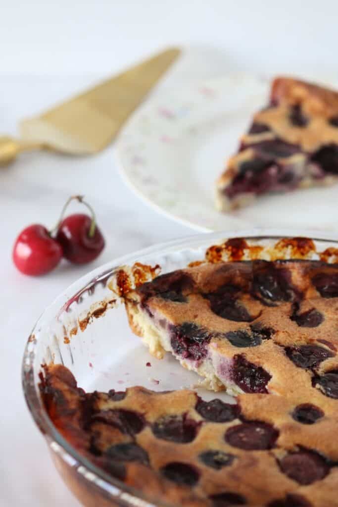 cherry clafoutis in a glass baking pan