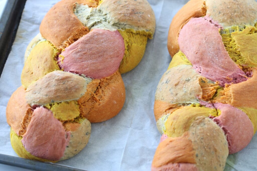baked rainbow challah bread