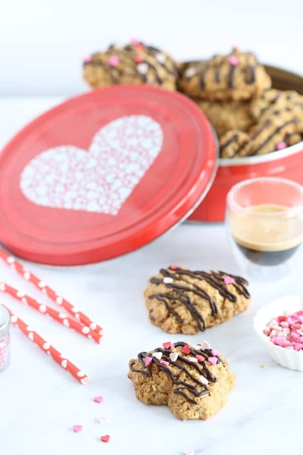 granola cookies with pecans and chocolate drizzle garnish