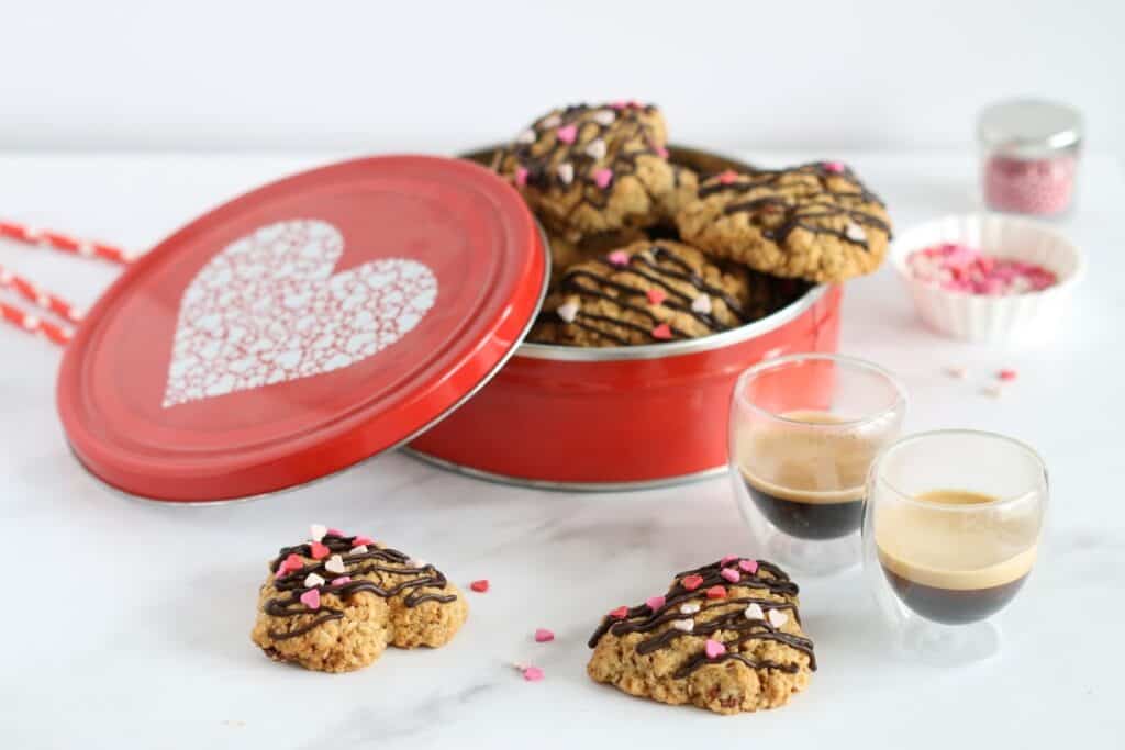 Granola Cookies in a red box with espresso cups