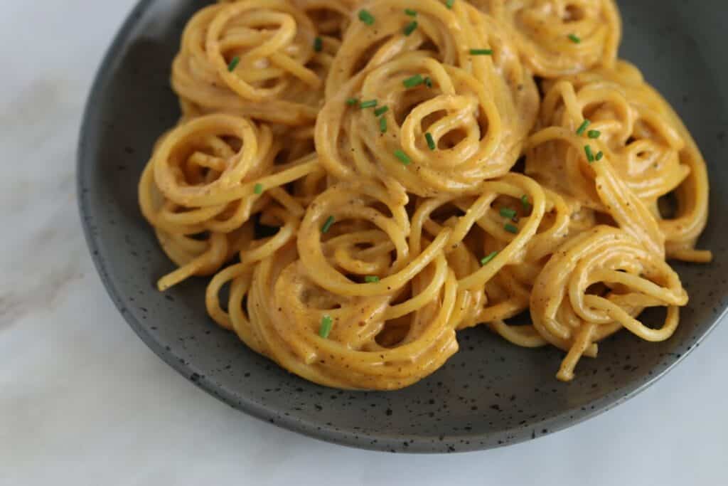 Pumpkin Alfredo pasta on a plate