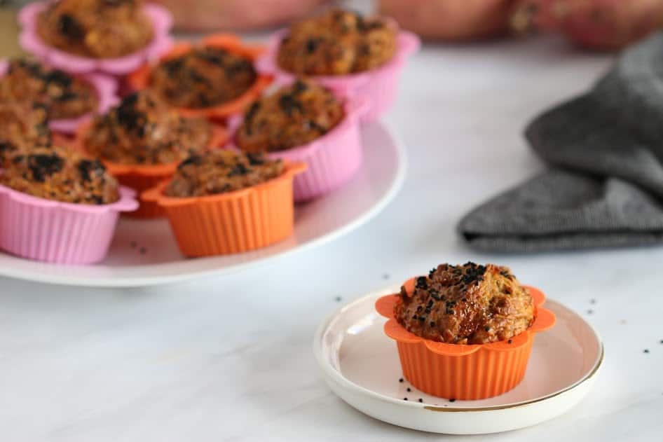 Sweet Potato Muffins in cases on a plate