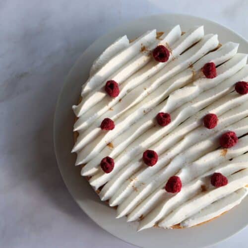 Lemon Raspberry Tart on a marble surface