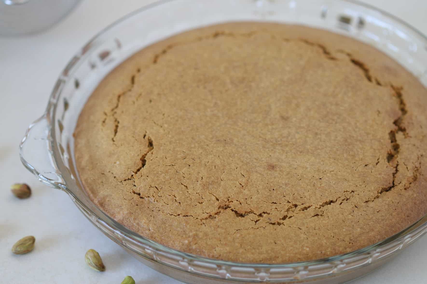 pistachio cake in a baking pan ungarnished